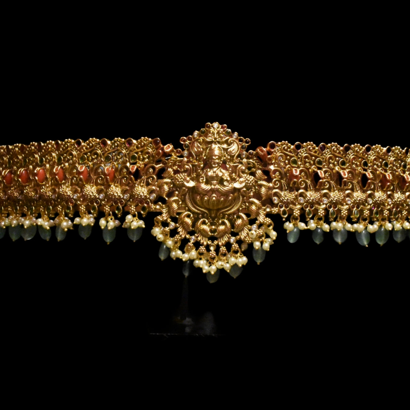 "Goddess Lakshmi's Blessing: A Stunning Antique Vaddanam Adorned with Coral & Kempu Stones for Your Wedding Day"