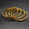 "Gilded Blooms: Stunning Gold-Plated CZ Bangles Adorned with Floral Motifs"