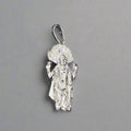 A sterling silver Lord Vishnu locket with intricate design, displayed against a rainy background.