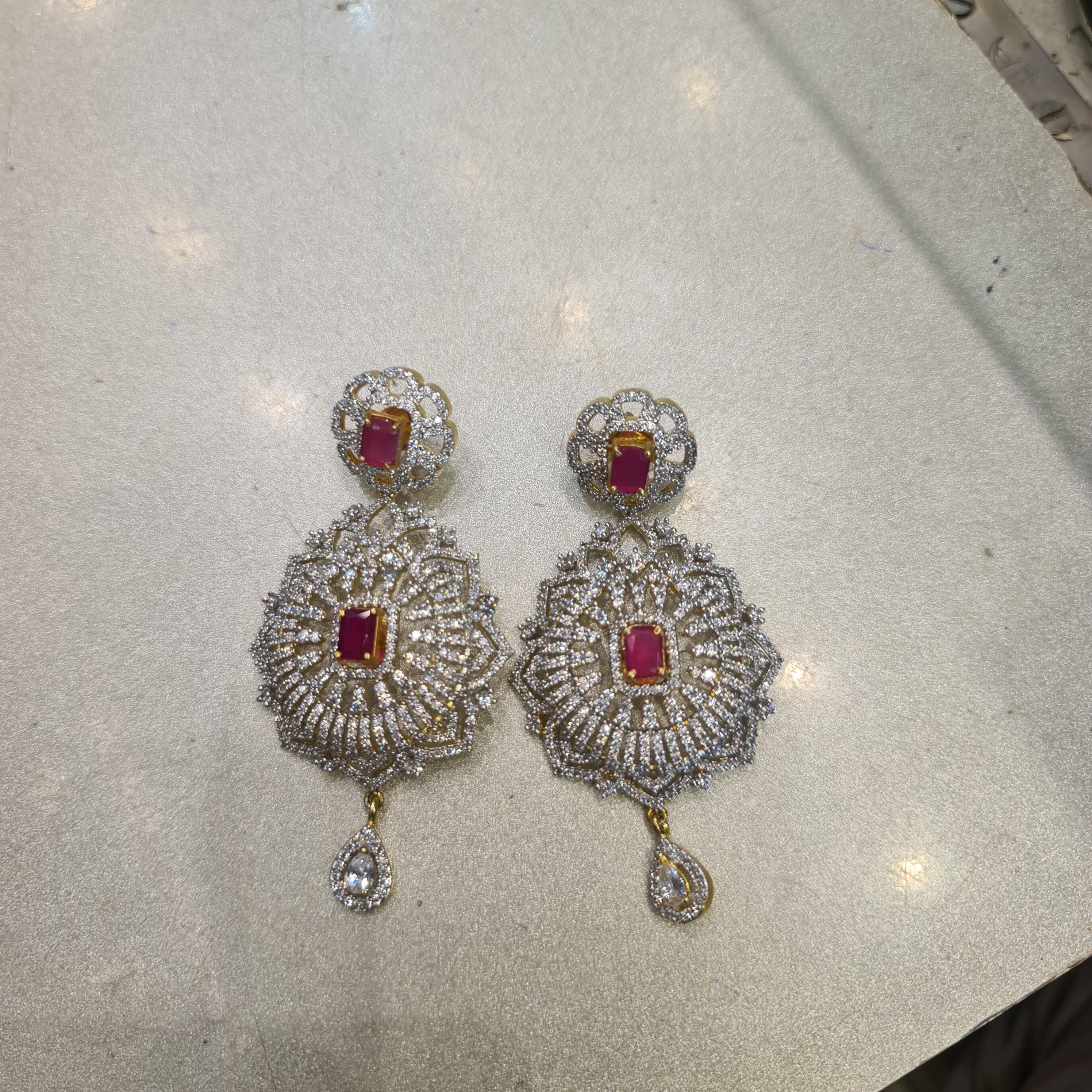 CZ Sunburst Floral Drop Earrings | Ruby Center Stone & Teardrop CZ Drop | Diamond Finish