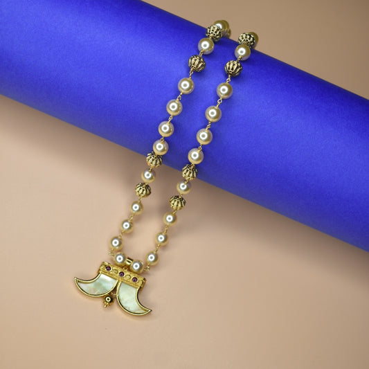 "Enchanting Elegance: Discover the Asp Fashion Kid's Puli Goru Locket with Pearl Chain"