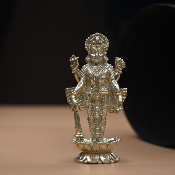 "Radiant Reverence: The Graceful Majesty of a Lord Vishnu Silver Idol"