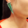 "Showstopper Style: Pastel Green Zircon Earrings with Elegant White Finish"