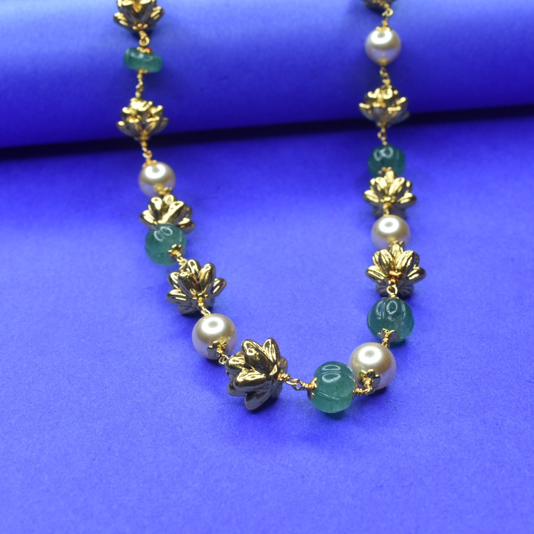 "Gorgeous Glamour: Enchanting Nakshi Gold Balls & Emerald Adorned Pearl Mala"