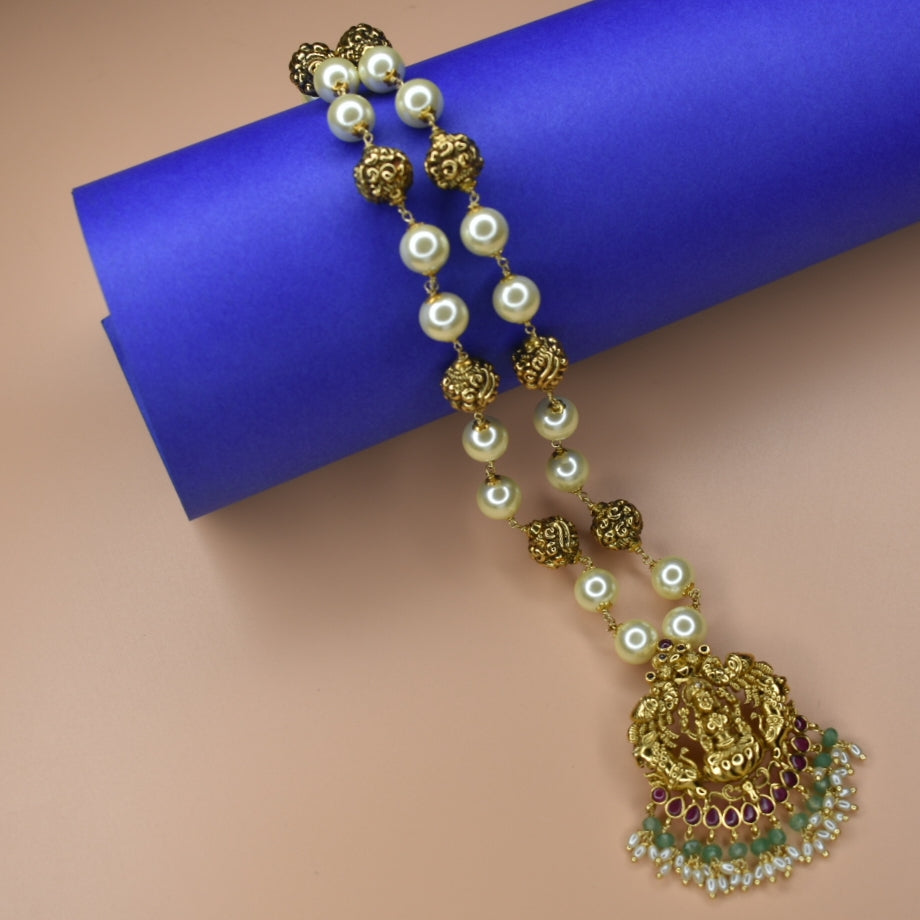 "Divine Elegance: Nagas Goddess Lakshmi Pendant Adorned with Pearl Chain"