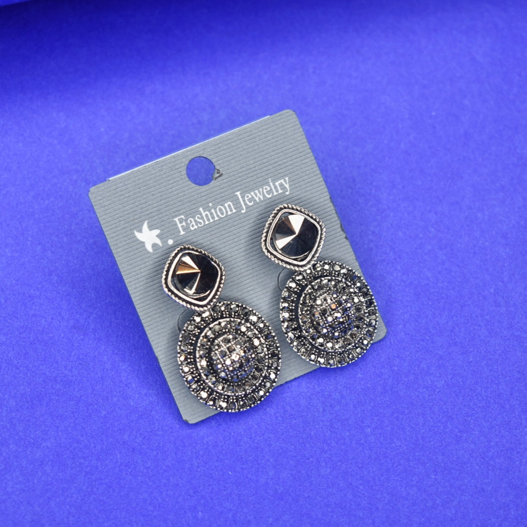 "Shine On: The Mesmerizing Beauty of Black Crystal Earrings"