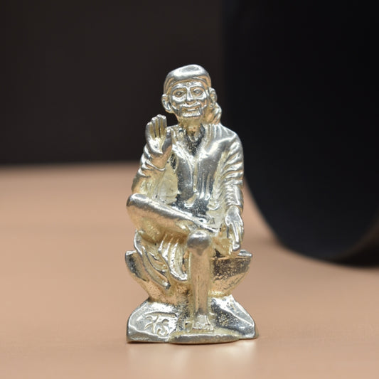 "Sacred Brilliance: Handcrafted Pure Silver Sai Baba Idol for Divine Blessings"