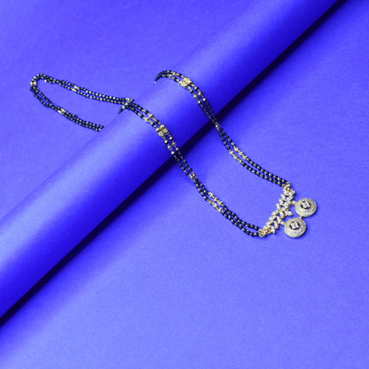 "Gleaming Elegance: The Exquisite Gold-Plated 26 inches Mangalsutra Adorned with American Diamonds and Beads"