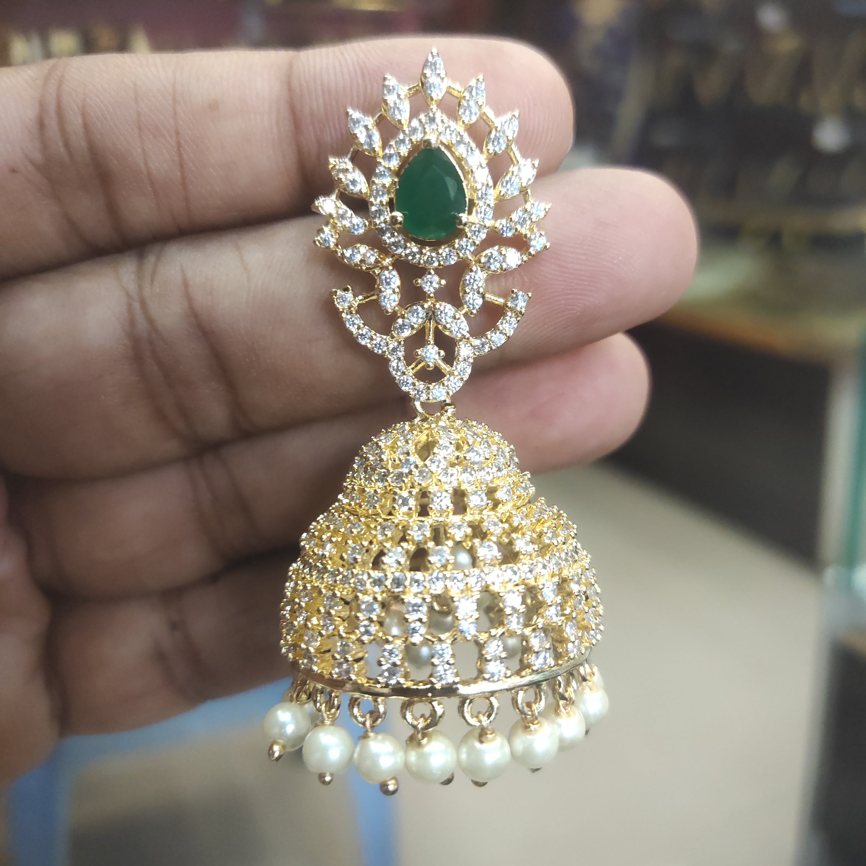 CZ Gold Plated Jhumka Earrings with Green Stone and Pearls