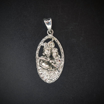 "Captivating Elegance: Antique Pure Silver Radha Krishna Pendant to Adorn Your Spiritual Style"