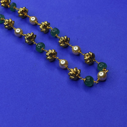 "Gorgeous Glamour: Enchanting Nakshi Gold Balls & Emerald Adorned Pearl Mala"