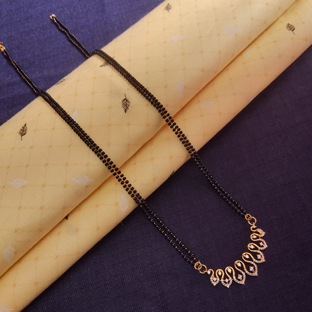 "Gleaming Elegance: The Exquisite Gold-Plated Mangalsutra Adorned with American Diamonds and Beads"