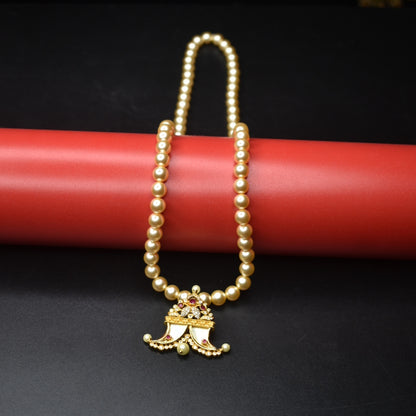 "Pearls of Elegance: Antique Finish Cz Puligoru Locket Necklace for Fashionable Kids"