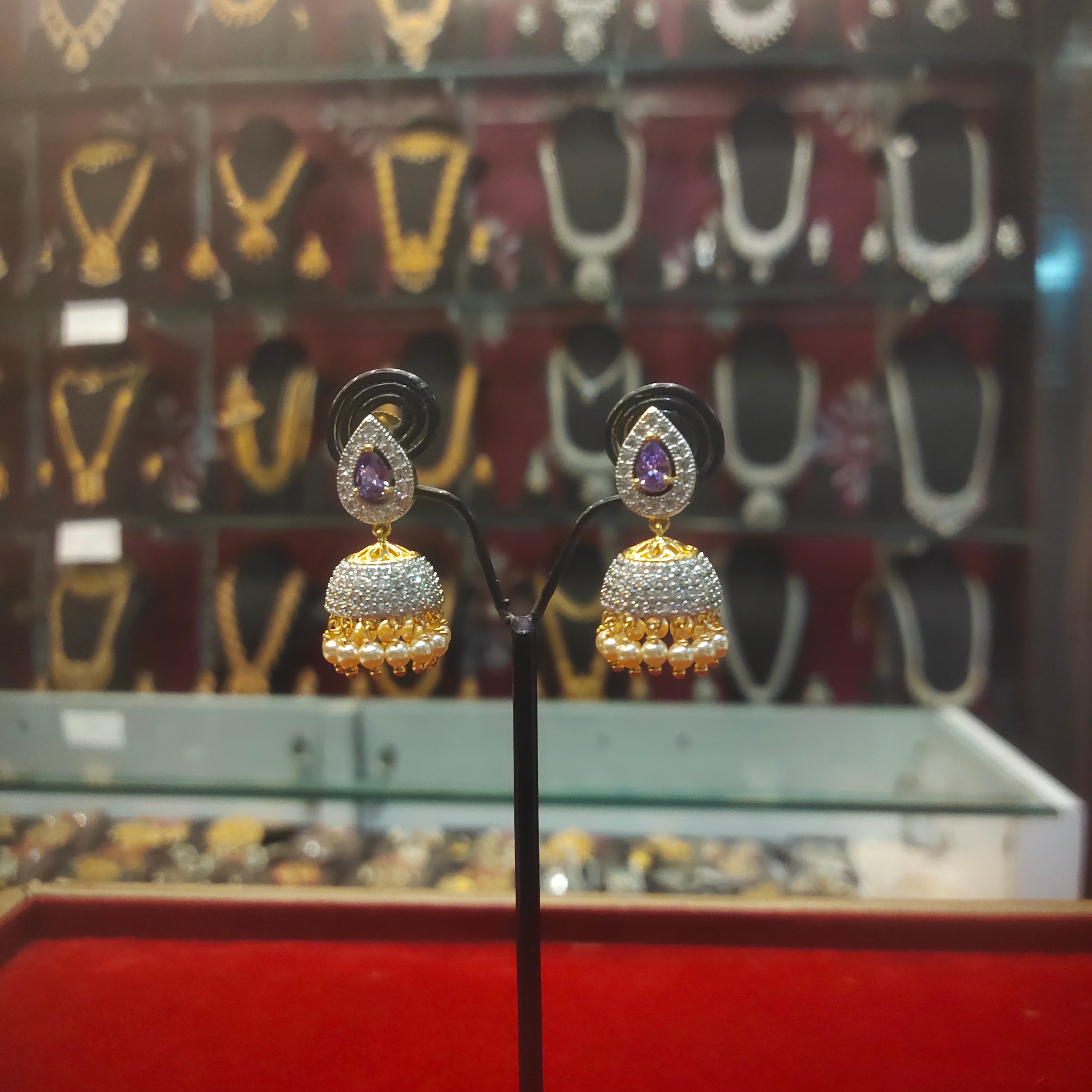 Rhodium-Gold Plated Zircon Diamond Jhumka Earrings - Purple Stone