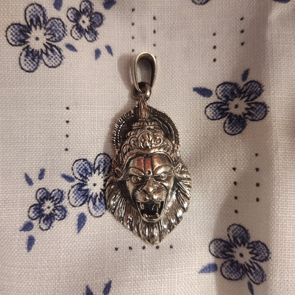 "The Majestic Lord Narasimha: A Sterling Silver Pendant to Embrace Your Devotion"