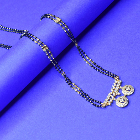 "Gleaming Elegance: The Exquisite Gold-Plated 26 inches Mangalsutra Adorned with American Diamonds and Beads"