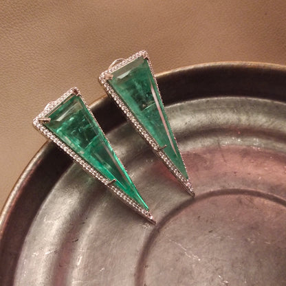 "Showstopper Style: Pastel Green Zircon Earrings with Elegant White Finish"