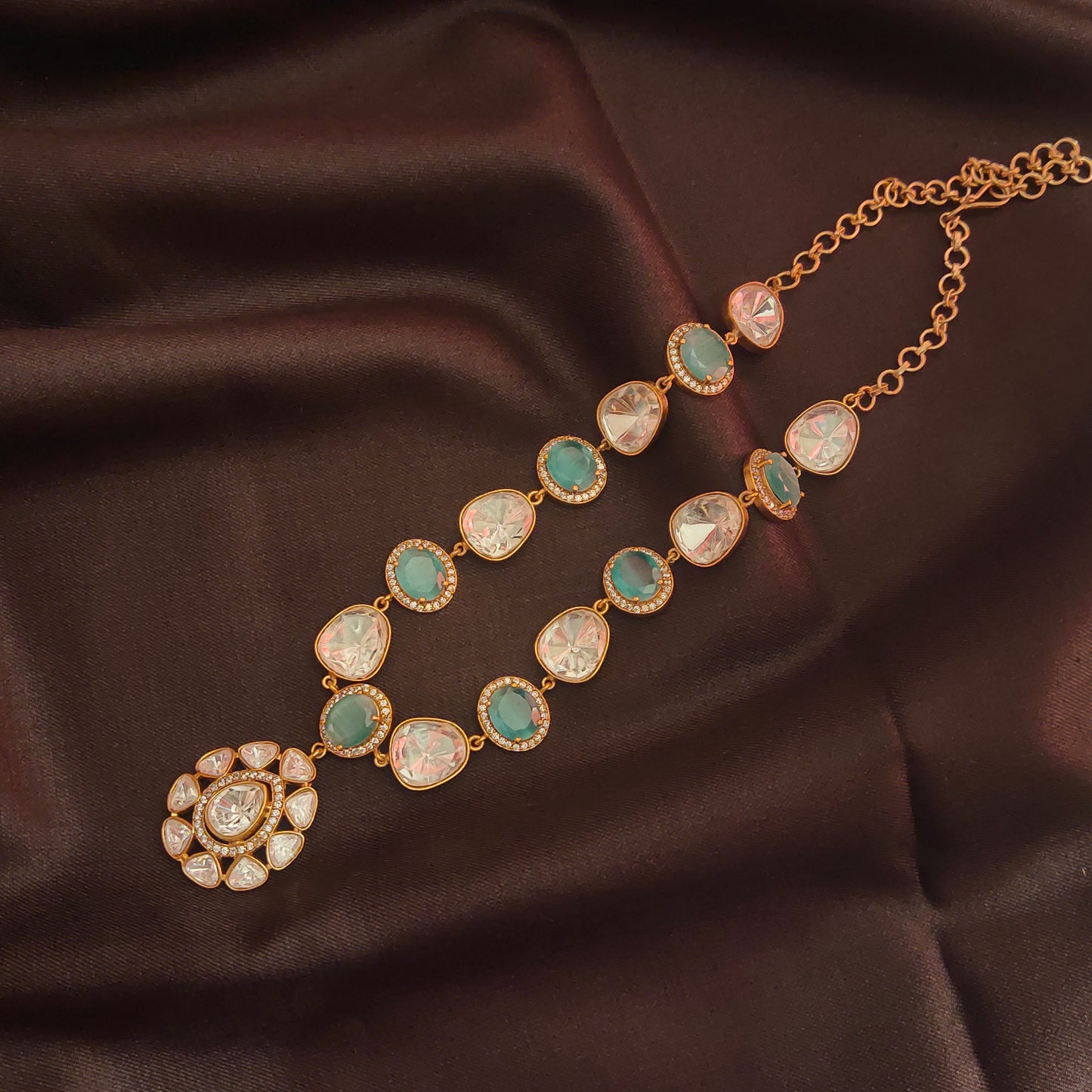 "Exude Elegance with the Royal Green Kundan Necklace Set: A Majestic Creation by Asp Fashion Jewellery"