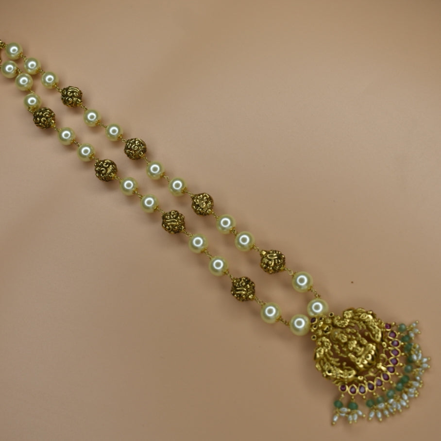 "Divine Elegance: Nagas Goddess Lakshmi Pendant Adorned with Pearl Chain"