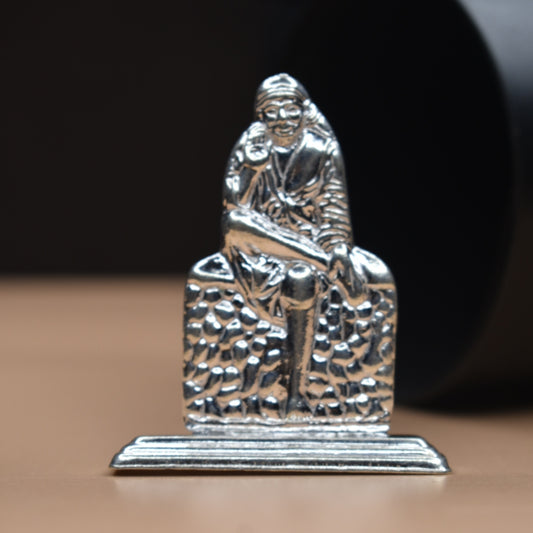 Sacred Brilliance: Handcrafted Pure Silver Sai Baba Idol for Divine Blessings"