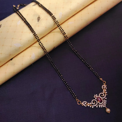 "Glamorous Fusion: The Ultimate Gold-Plated Mangalsutra adorned with American Diamonds and Beads"