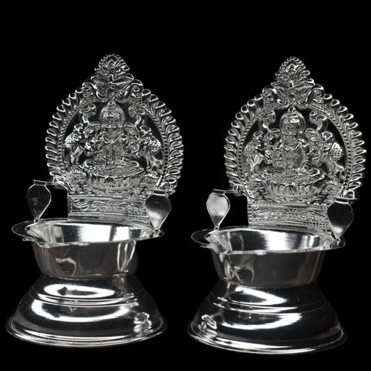 "Shine Bright: The Exquisite Pure Silver Kamakshi Deepam Set"