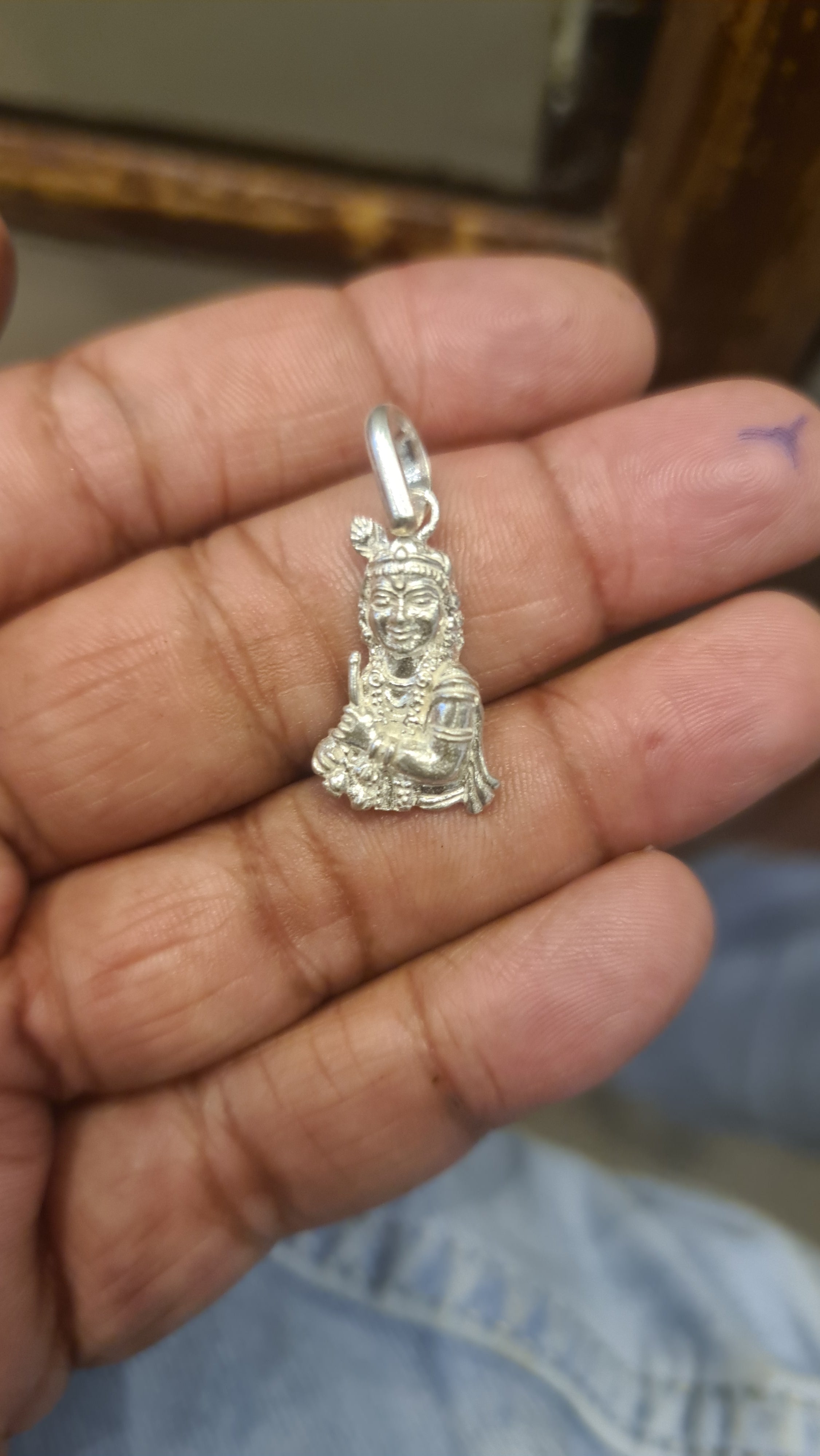 Shine Bright: The Divine Silver Bal Gopal Locket for Protection and Connection