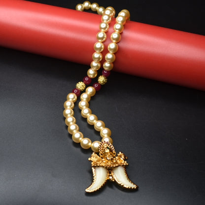 "Majestic Charm: Vintage Balaji Puligoru Pendant Adorned with Pearls"