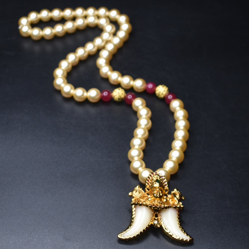 "Majestic Charm: Vintage Balaji Puligoru Pendant Adorned with Pearls"