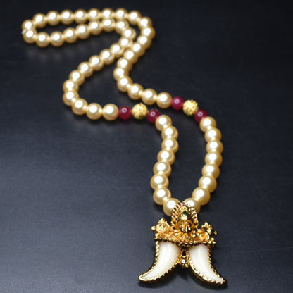 "Majestic Charm: Vintage Balaji Puligoru Pendant Adorned with Pearls"