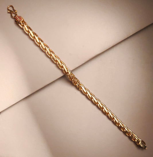 "Glistening Elegance: The Exquisite Gold-Plated Bracelet for the Modern Gentleman"