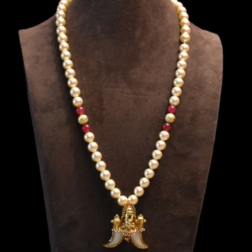 "Majestic Charm: Vintage Balaji Puligoru Pendant Adorned with Pearls"