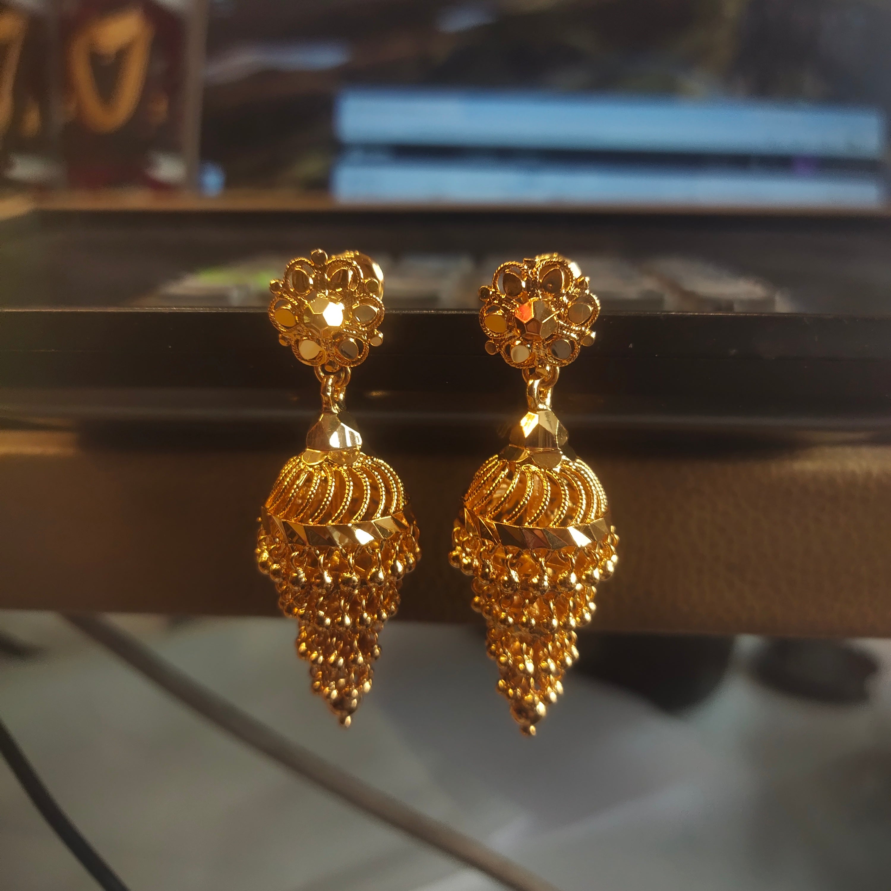 Gold Plated Elongated Ribbed Jhumka Earrings with Cascading Bead Tassel | Statement Ethnic Jewelry