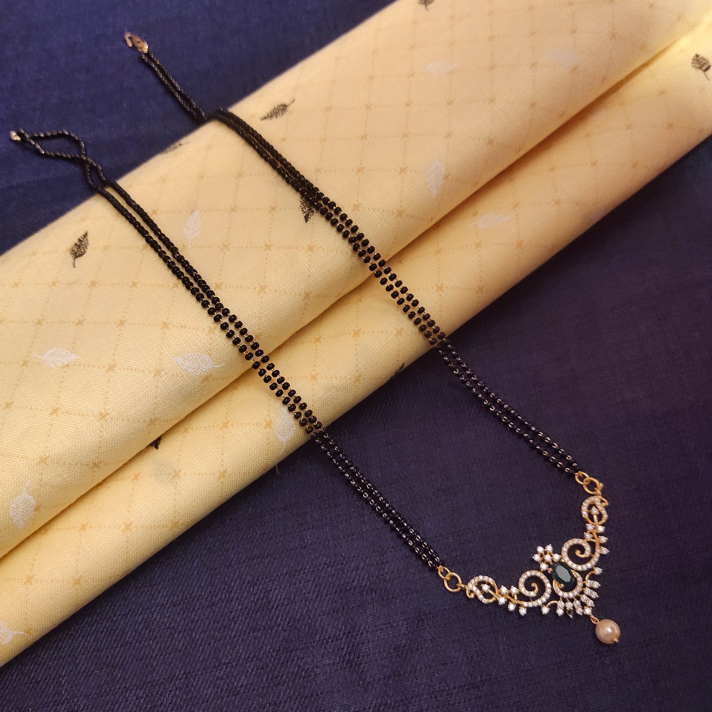 "Radiant Elegance: The Luxurious Gold-Plated American Diamond Mangalsutra"