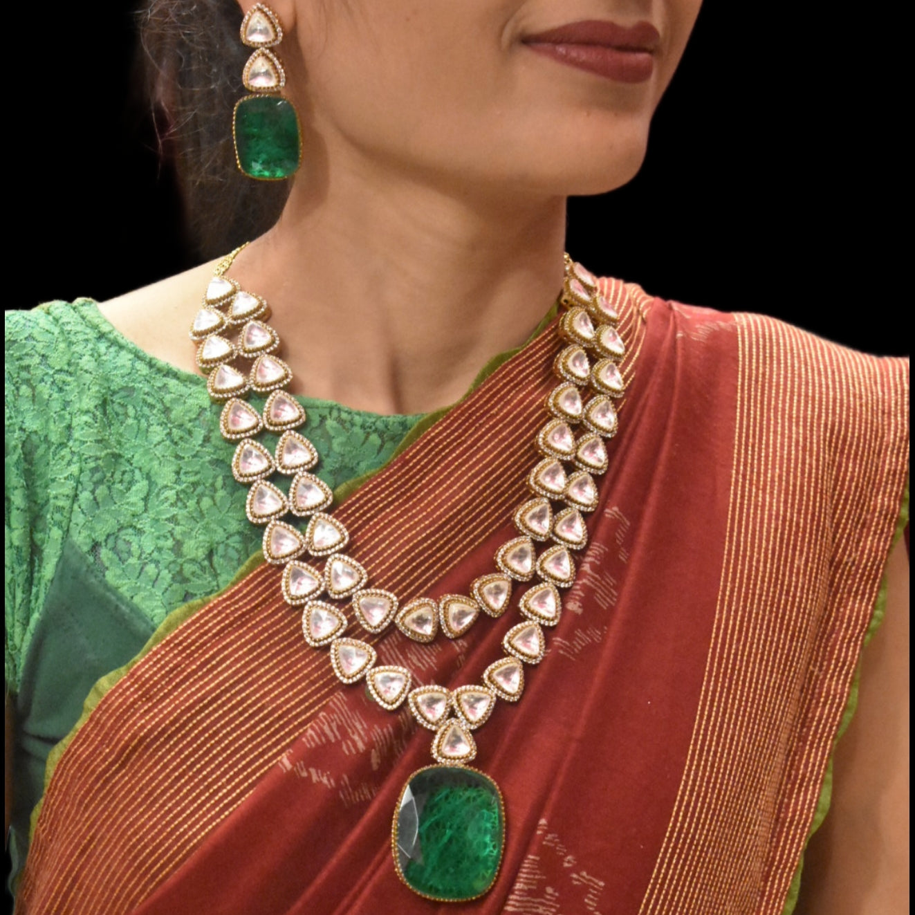 "Dazzle in Double Layers: The Exquisite Asp Fashion Emerald & Kundan Necklace Set"