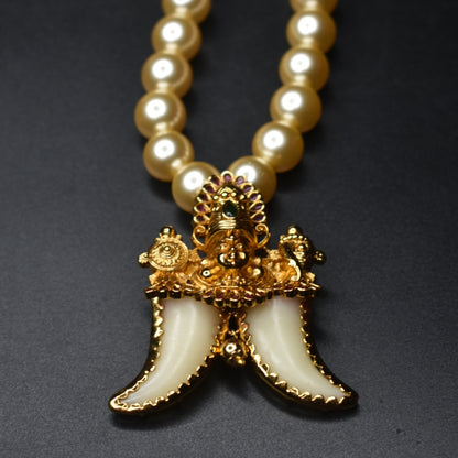 "Majestic Charm: Vintage Balaji Puligoru Pendant Adorned with Pearls"