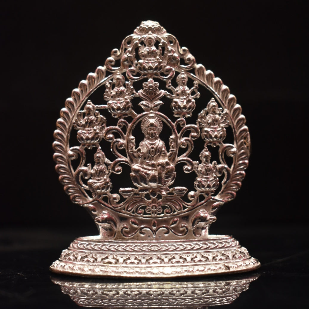 "Crafted Elegance: Handmade Solid Silver Ashtalakshmi Goddess Idol for Divine Décor"