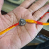 "Shimmering Blessings: 92.5 Silver Ganesh Rakhi - A Symbol of Divine Protection and Style"