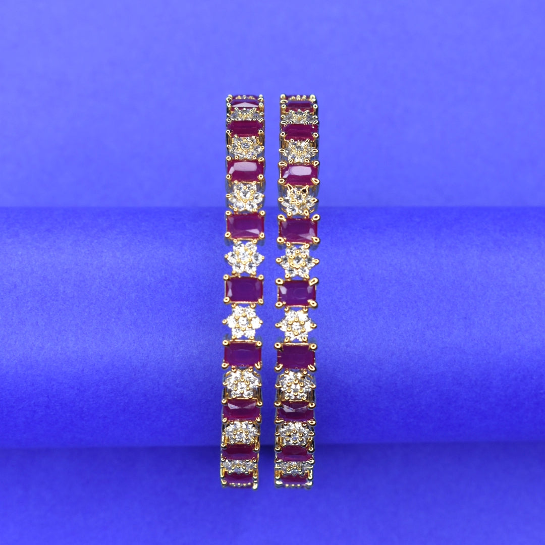 "Luxurious Elegance: Gold Plated Bangles Adorned with Rubies and American Diamonds"