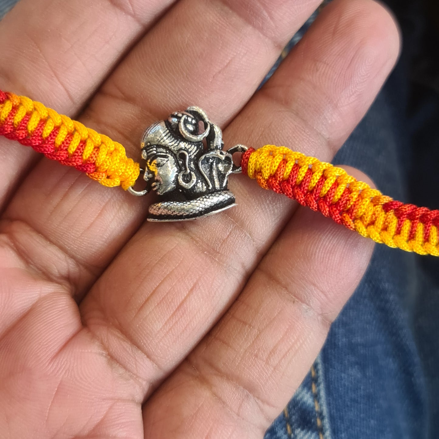 "Divine Connection: Exquisite 92.5 Silver Lord Shiva Rakhi for Protection and Blessings"