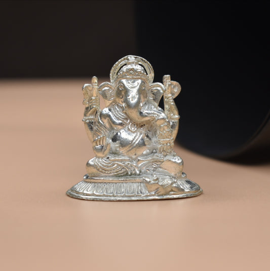 "Shining Blessings: The Elegance of a Pure Silver Ganpati Idol"