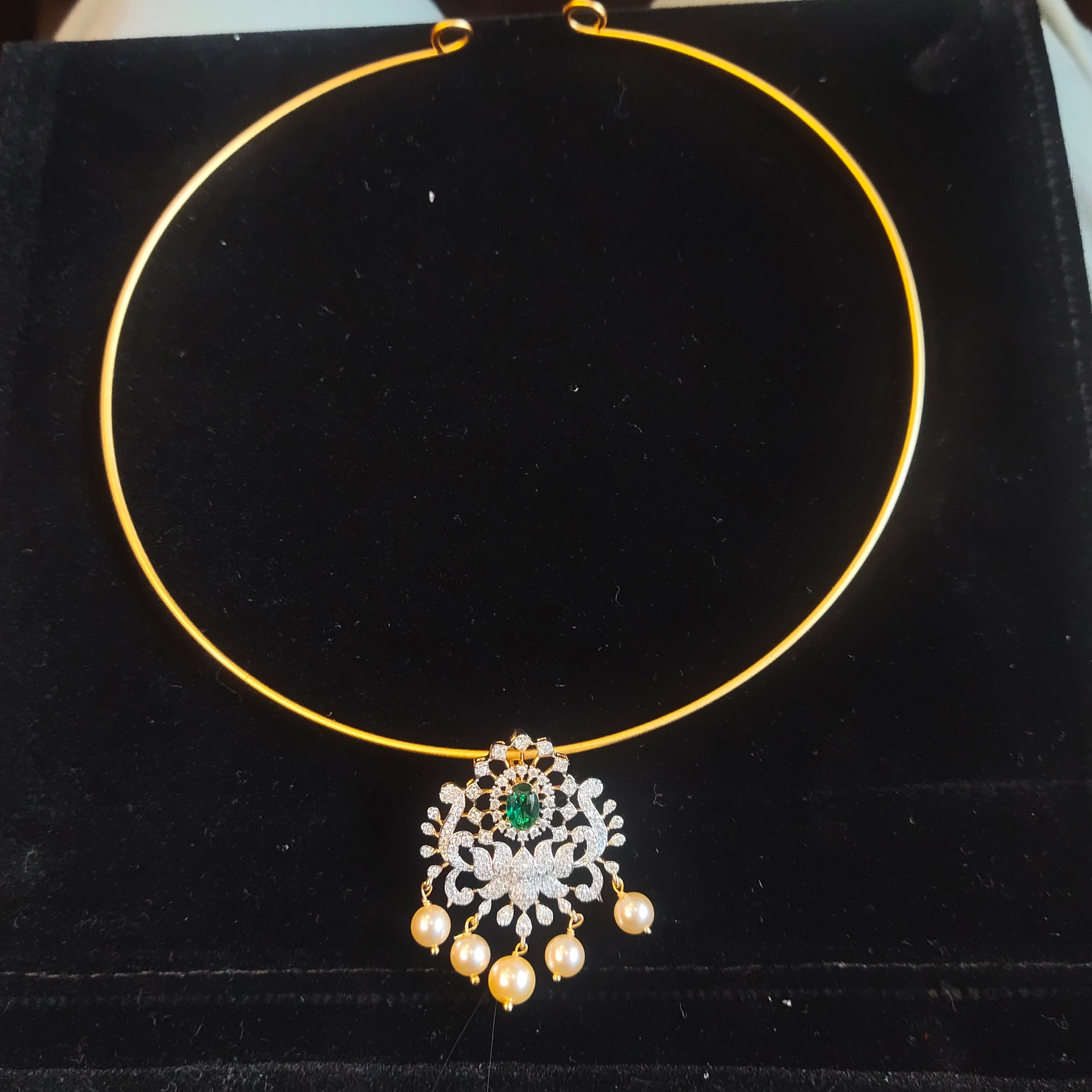 Gold hasli choker necklace with CZ diamond pendant, emerald green stone and pearl drops