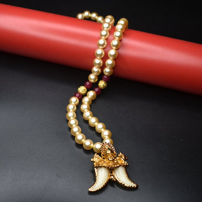 "Majestic Charm: Vintage Balaji Puligoru Pendant Adorned with Pearls"