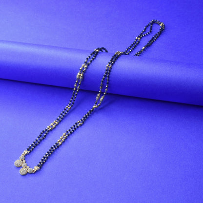 Gleaming Elegance: The Exquisite Gold-Plated 26 inches Mangalsutra Adorned with American Diamonds and Beads"