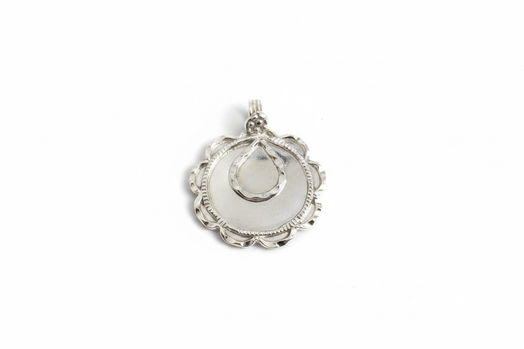 Silver Pendant on White Background