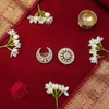 Temple jewelry flat lay with cultural elements