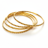 Traditional Panchaloha Bangles on White Background