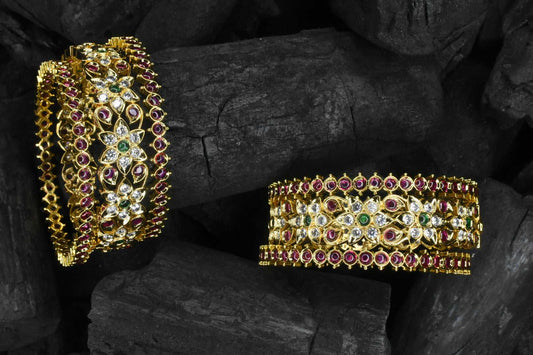 Beautiful composition of  Ruby emralds with American diamonds Bangles set