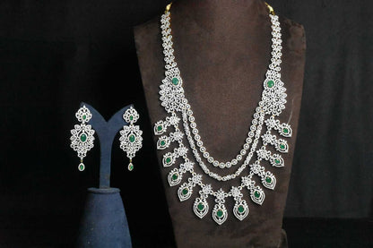 Gorgeous American diamond haram highlighted with emeralds. 