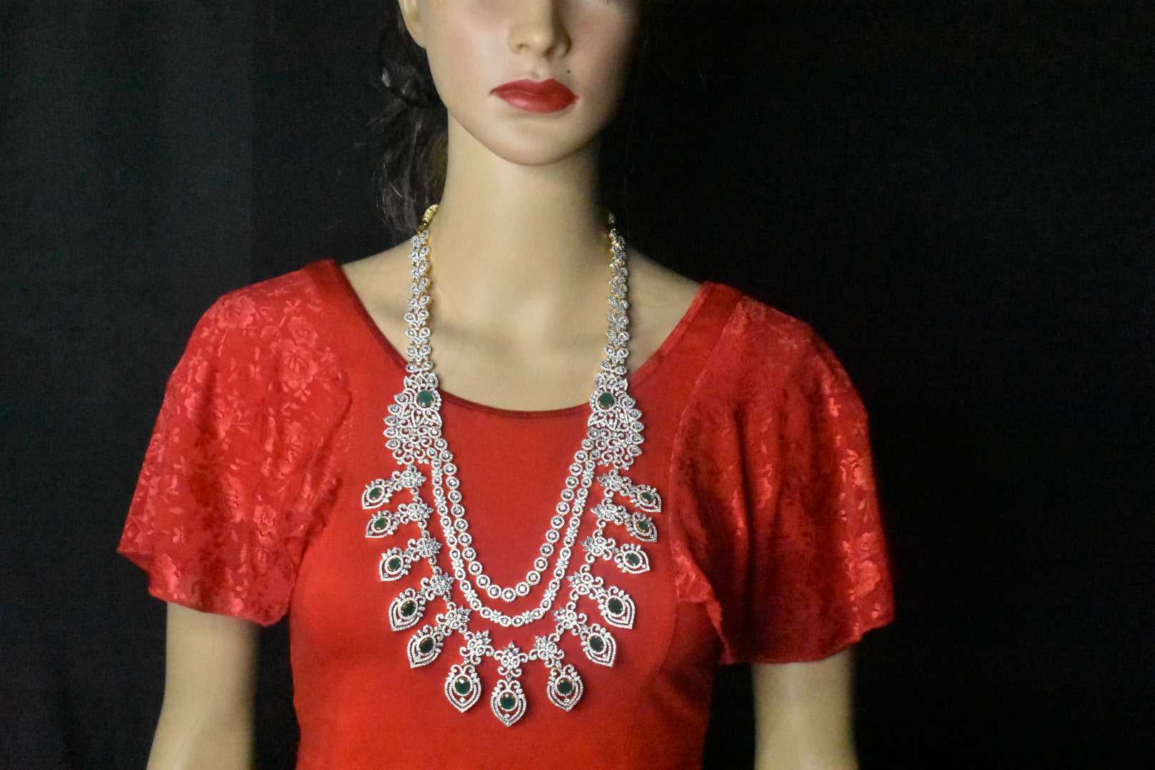 Gorgeous American diamond haram highlighted with emeralds. 